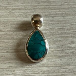 Silver and Turquoise colored Pendant